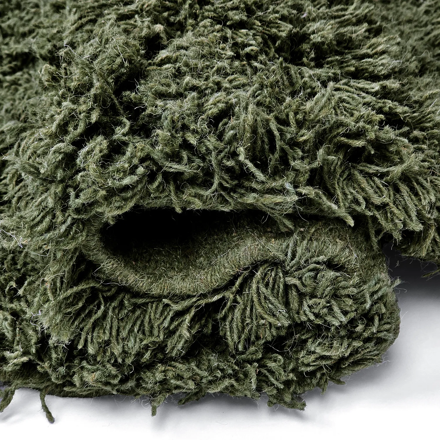 Tapis rond - Fassale Hand Woven Wool Shaggy (vert mousse)